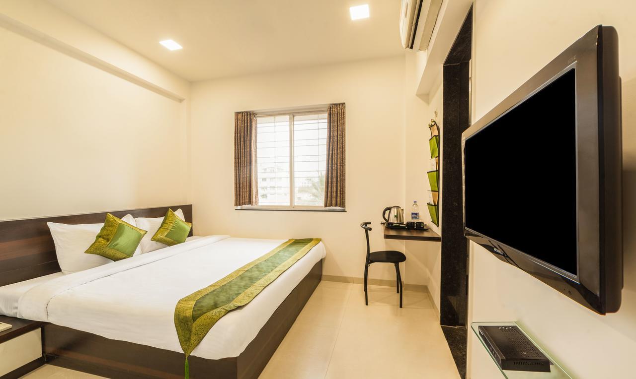 Hotel Treebo Trend Abode à Nashik Extérieur photo